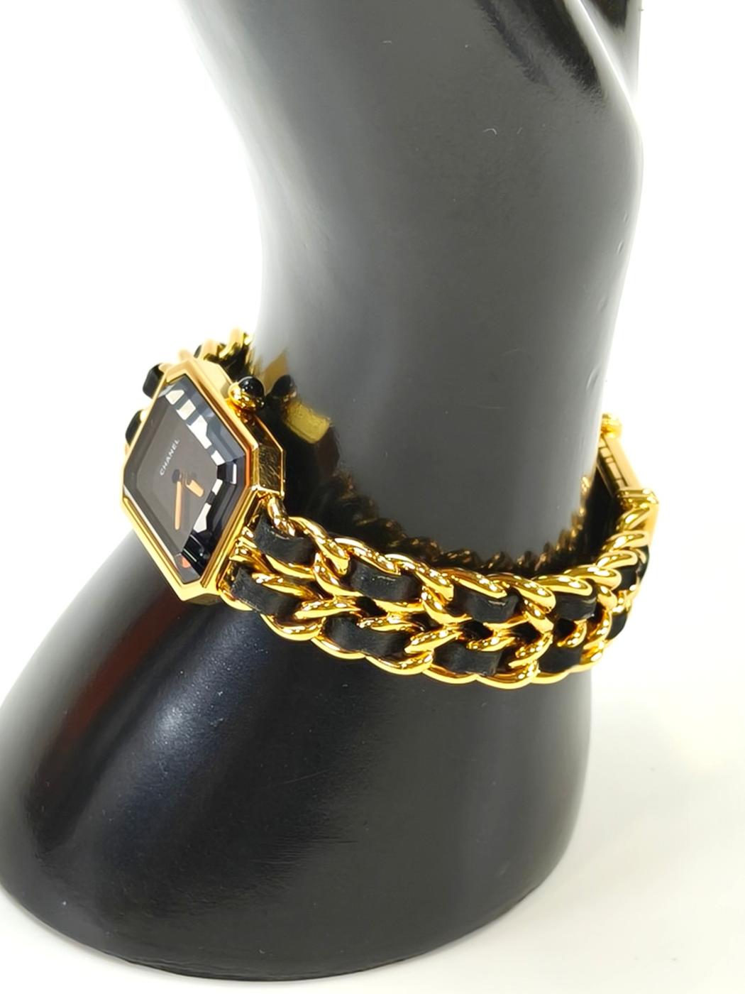 CHANEL Premiere Large Octagonal Chain Bracelet with Leather Strap and Quartz Analogue Movement in Gold. Reference Number: 10455.